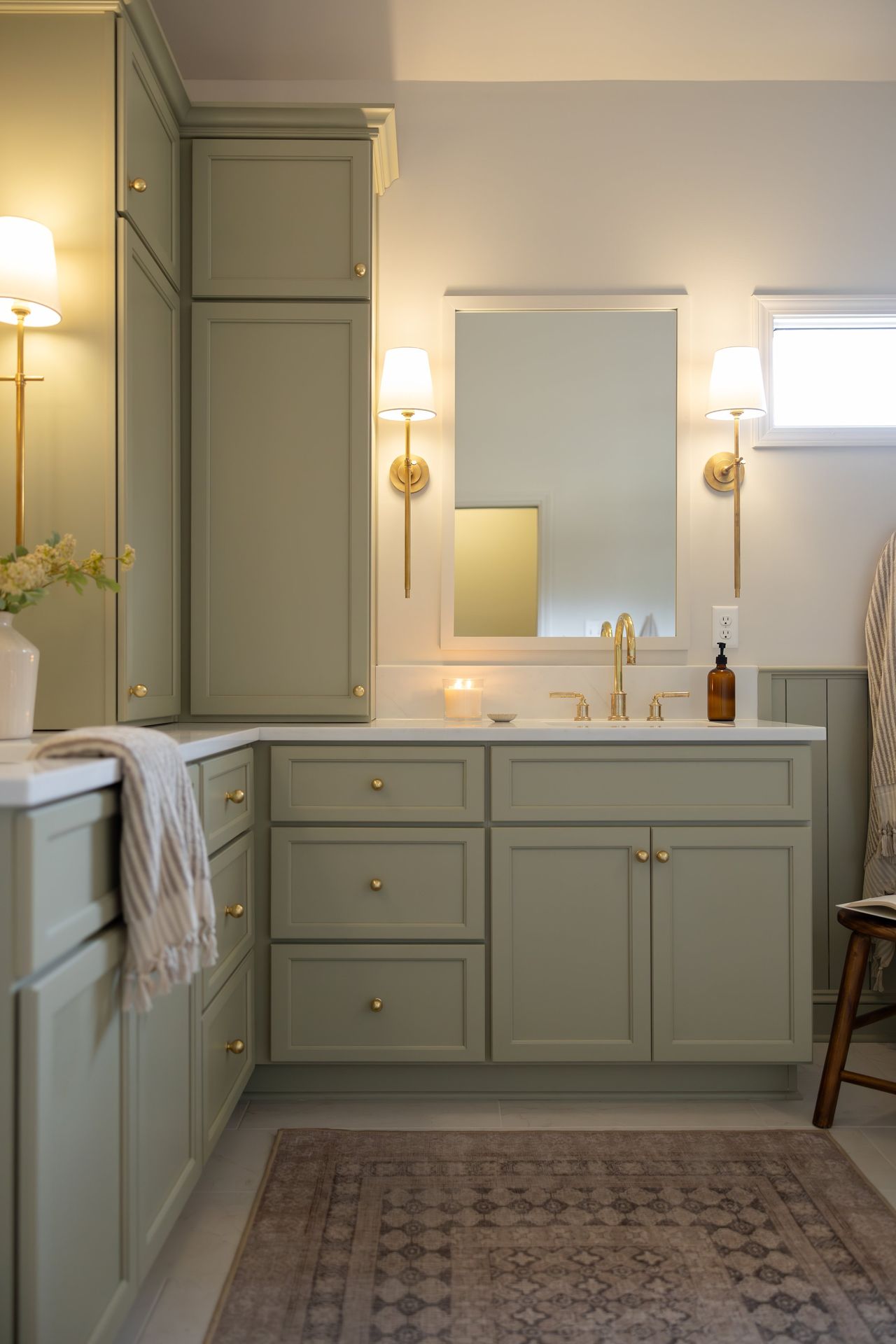 Green bathroom vanity by Designer Cabinets