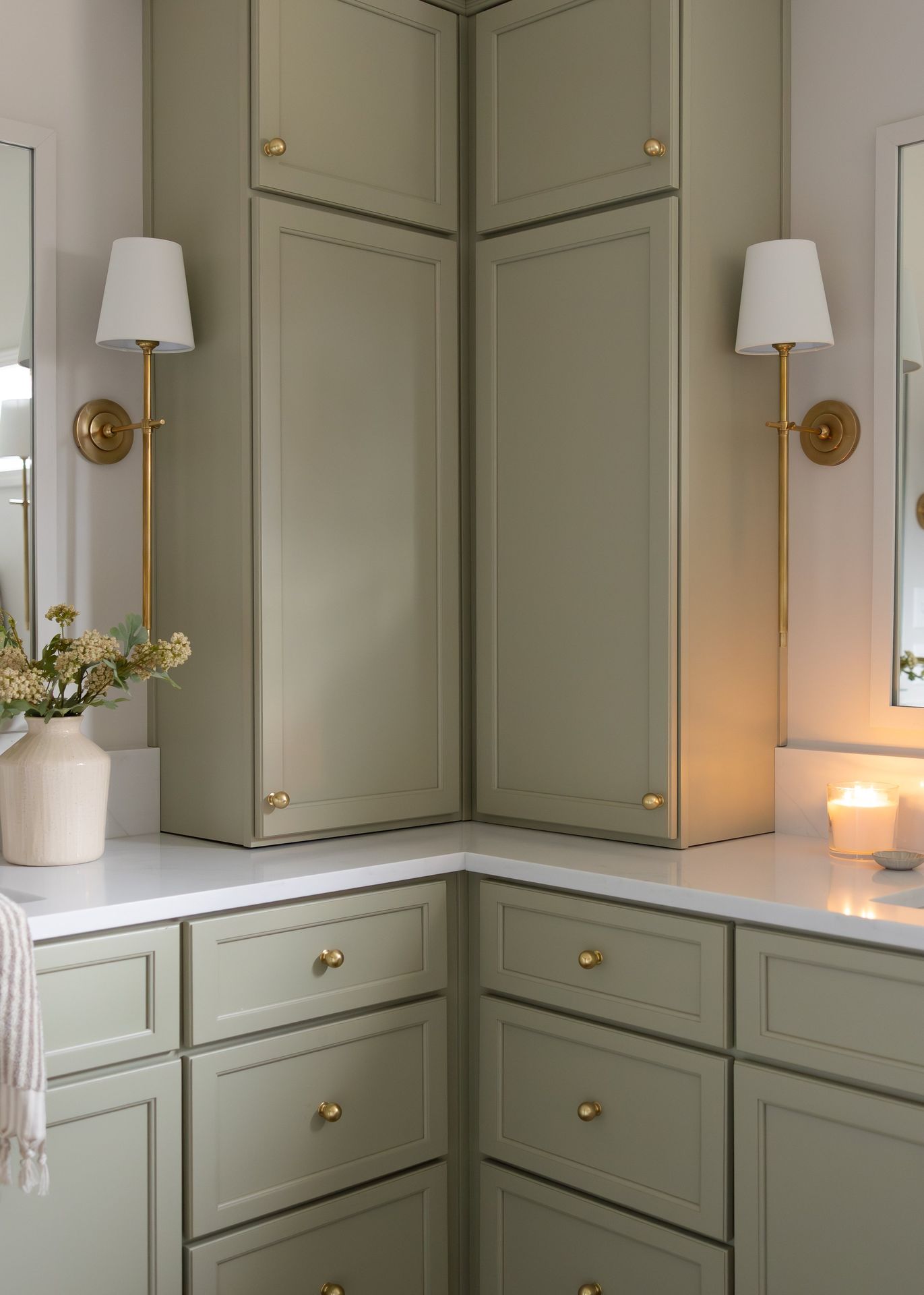 Green bathroom vanity by Designer Cabinets