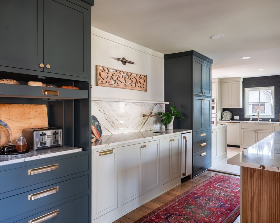 Blue and greige shaker kitchen cabinetry by Designer Cabinets