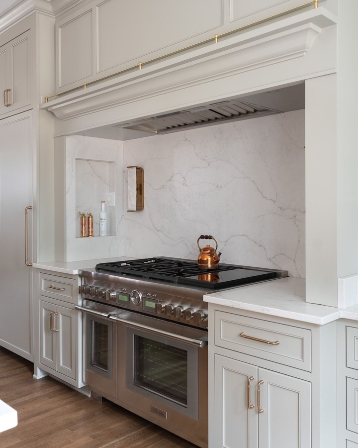 Gray and wood shaker kitchen cabinetry by Designer Cabinets