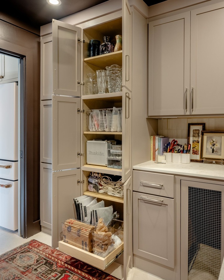 Greige shaker pantry cabinetry by Designer Cabinets