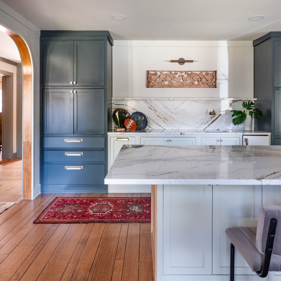 Greige shaker kitchen cabinetry by Designer Cabinets