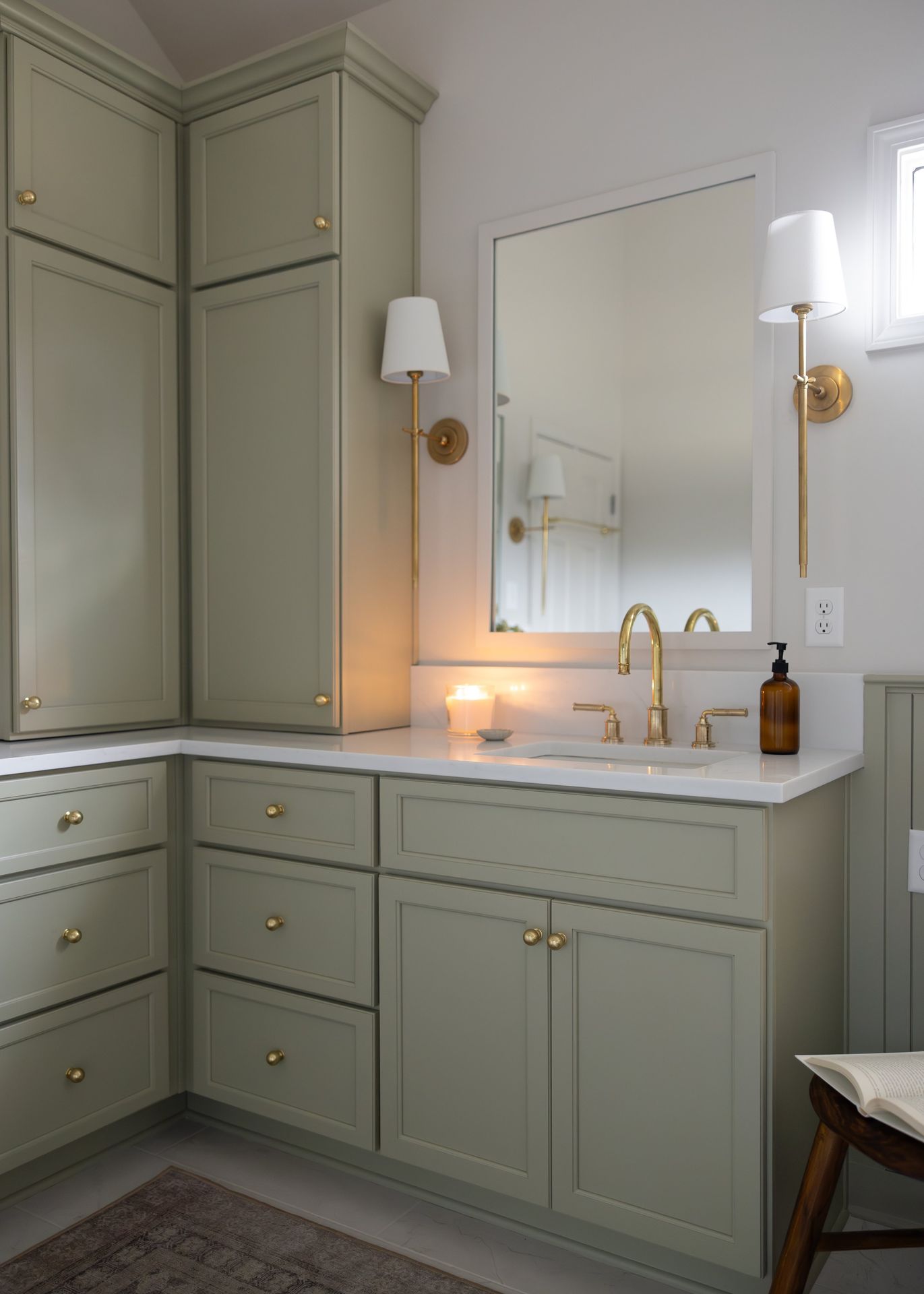 Green bathroom vanity by Designer Cabinets