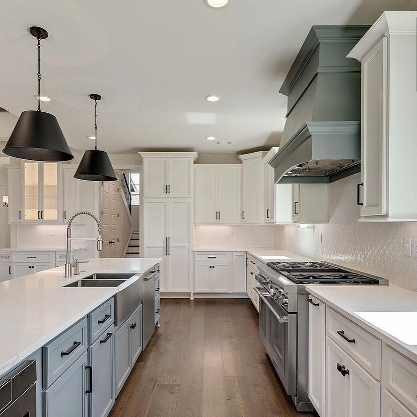 White and gray shaker kitchen cabinetry by Designer Cabinets