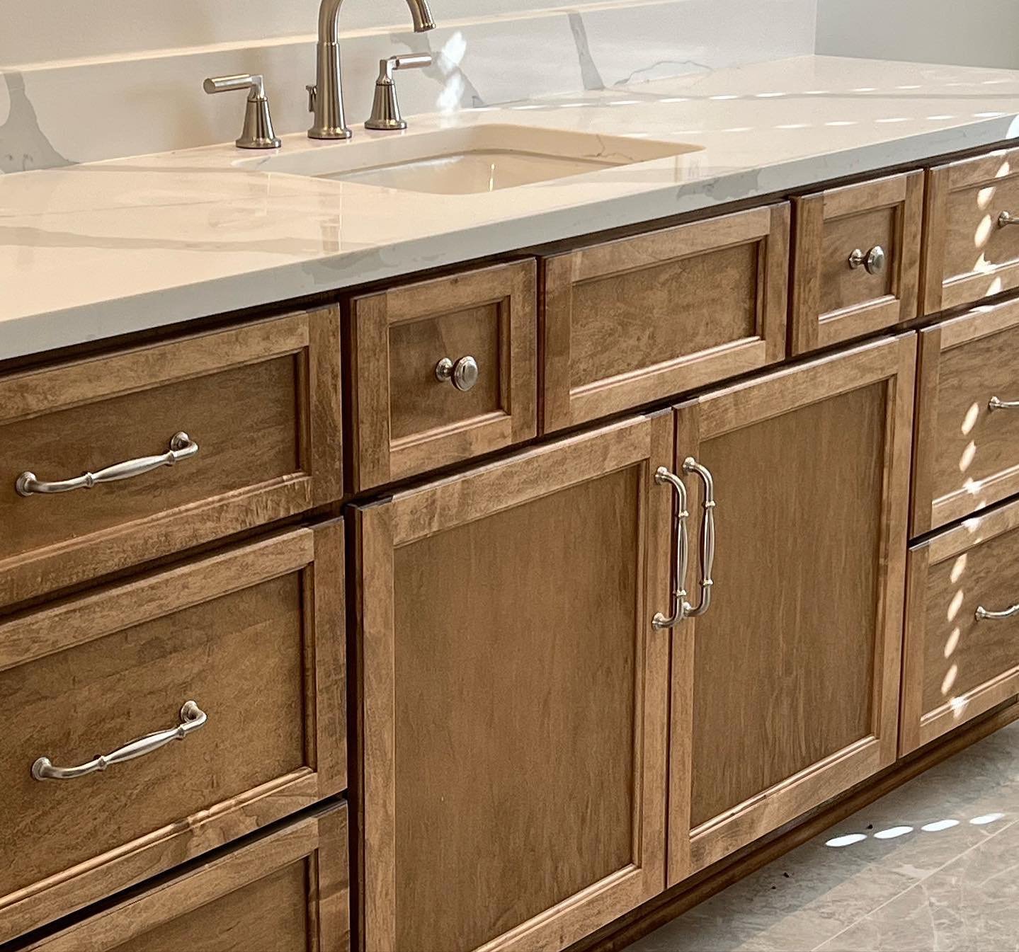 Custom bathroom and laundry cabinets by Designer Cabinets