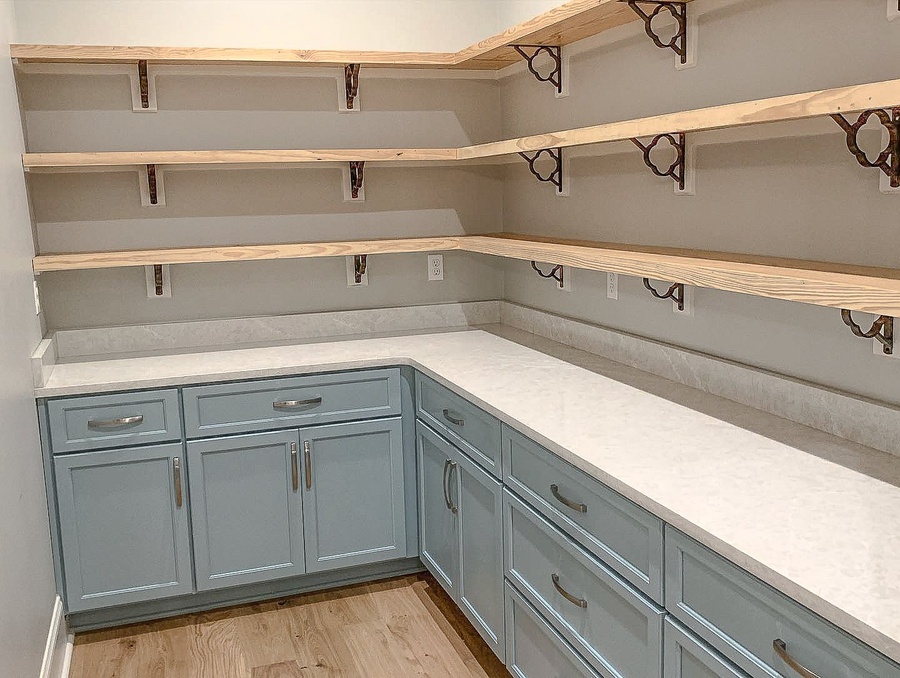 Blue shaker pantry cabinetry by Designer Cabinets