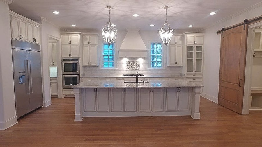 White shaker kitchen cabinetry by Designer Cabinets
