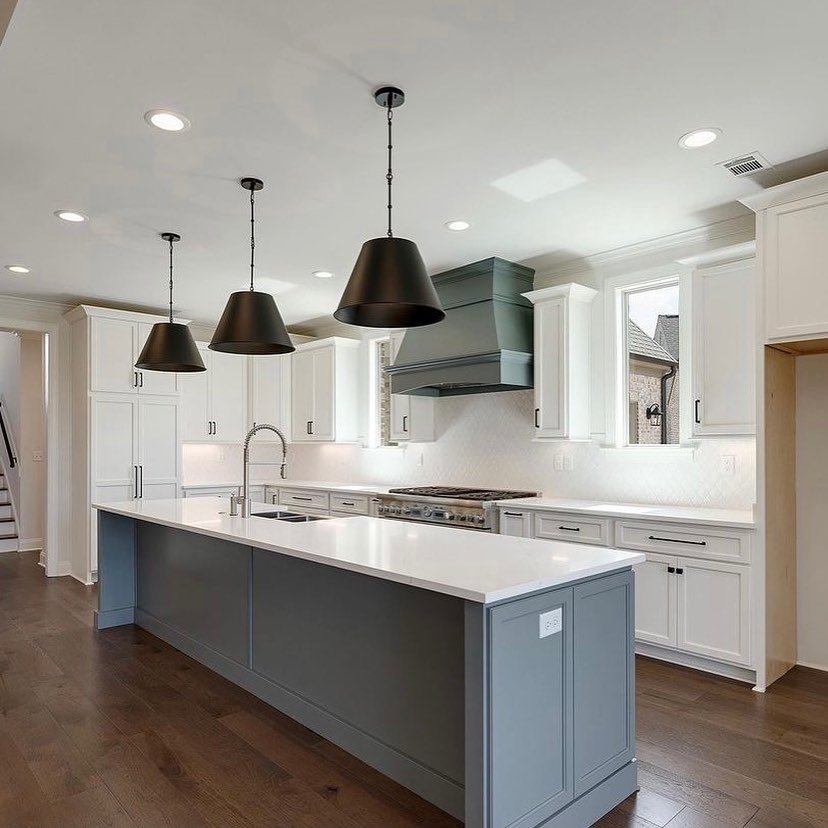 White and gray shaker kitchen cabinetry by Designer Cabinets