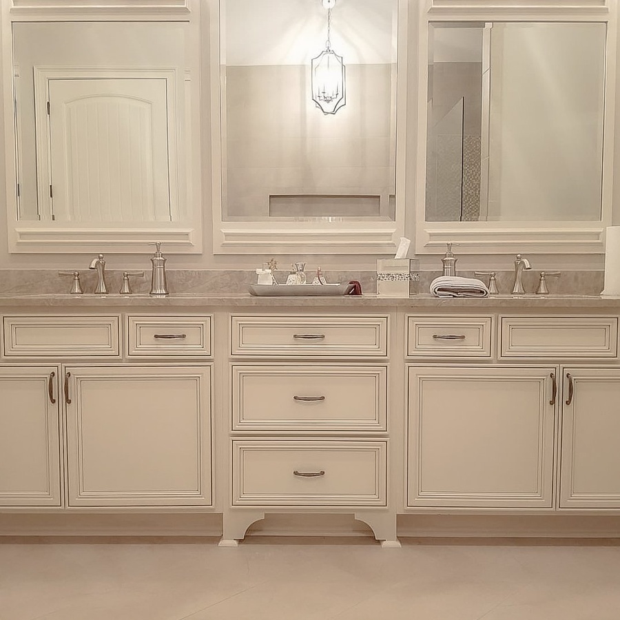 White shaker bath cabinetry by Designer Cabinets