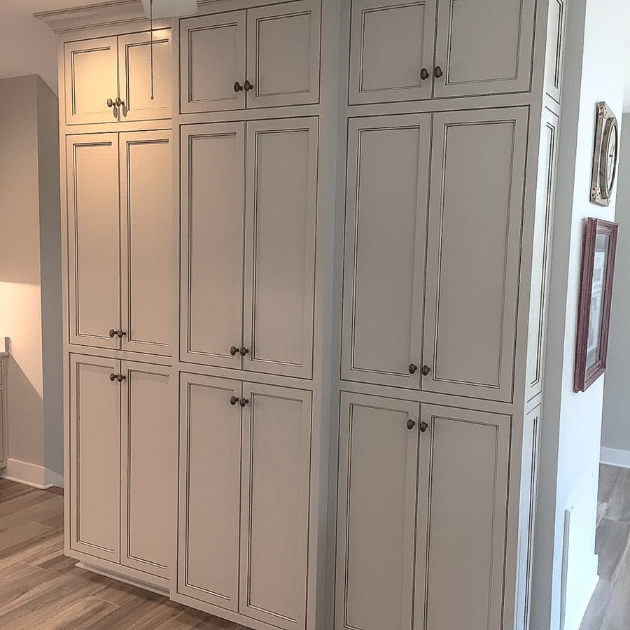 Greige shaker kitchen cabinetry by Designer Cabinets