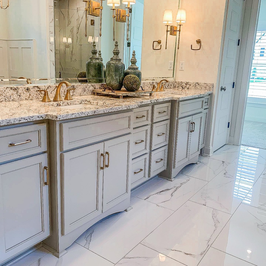 Gray shaker bath cabinetry by Designer Cabinets