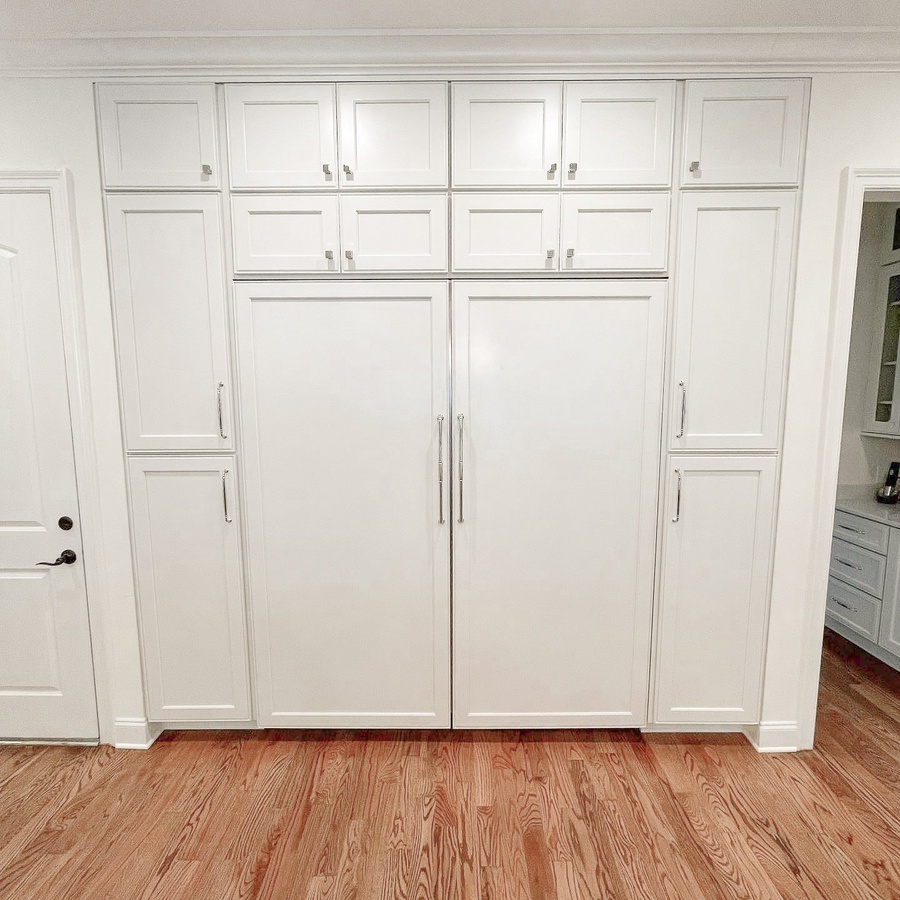 White shaker kitchen cabinetry by Designer Cabinets