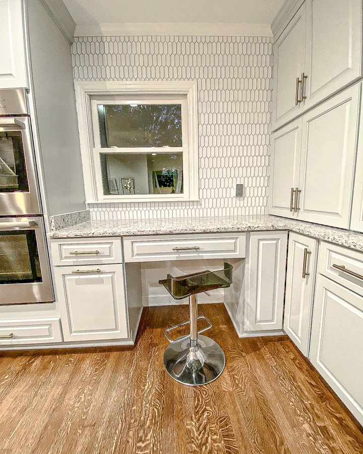 White shaker kitchen cabinetry by Designer Cabinets